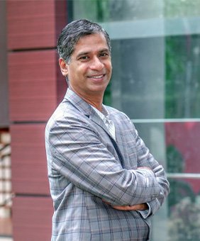 Dr. Thomas George (Thomman)